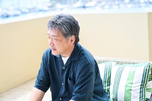This photo provided by CJ ENM shows Japanese filmmaker Hirokazu Kore-eda, who wrote and directed "Broker." (PHOTO NOT FOR SALE) (Yonhap)