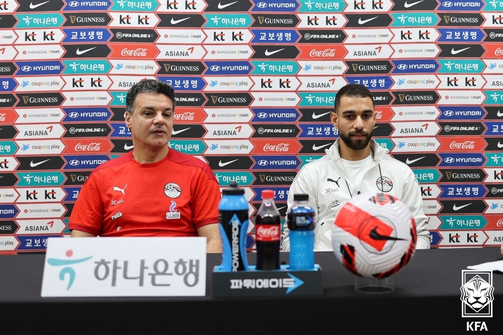 Egypt head coach Ehab Galal (L) and captain Amr El Solia attend an online press conference at Seoul World Cup Stadium in Seoul on June 13, 2022, the eve of a friendly match against South Korea, in this photo provided by the Korea Football Association. (PHOTO NOT FOR SALE) (Yonhap)