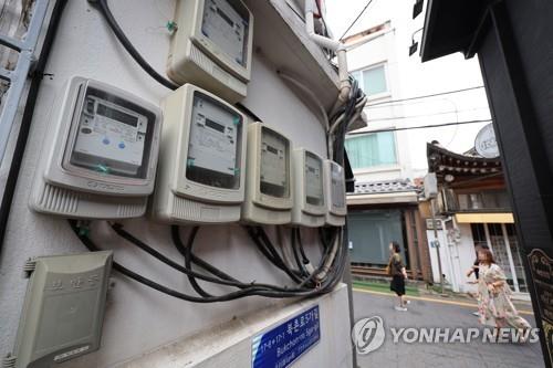 This file photo taken June 19, 2022, shows electric meters set up in a residential area in Seoul. (Yonhap)