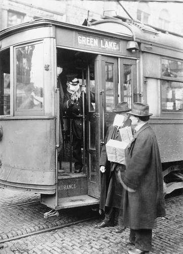 This photo provided by the National Museum of Korean Contemporary History shows a streetcar conductor denying boarding for a passenger without a mask in Seattle during the Spanish flu pandemic in 1918-19. (PHOTO NOT FOR SALE) (Yonhap)