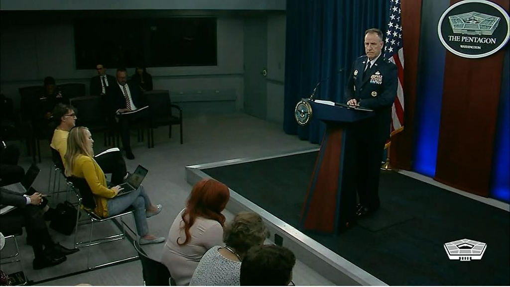 Department of Defense spokesperson Brig. Gen. Pat Ryder (R, at podium) is seen taking a question during a daily press briefing at the Pentagon in Washington on Oct. 25, 2022 in this image captured from the department's website. (Yonhap)
