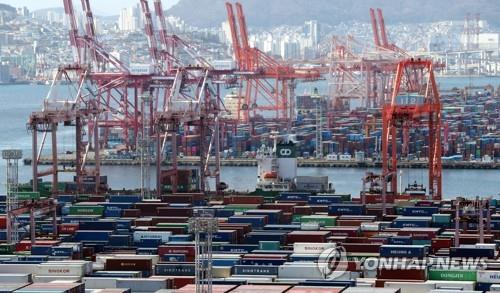 This file photo taken Jan. 10, 2023, shows stacks of containers at a port in South Korea's southeastern city of Busan. (Yonhap)