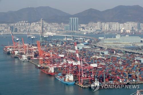 Containers are stacked at a port in the southeastern city of Busan on Feb. 26, 2023. (Yonhap)