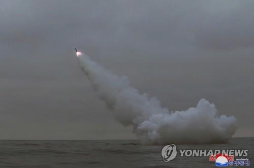 This photo, carried by North Korea's official Korean Central News Agency on March 13, 2023, shows the North's firing of two "strategic cruise missiles" from a submarine in waters off its east coast the previous day. (For Use Only in the Republic of Korea. No Redistribution) (Yonhap)