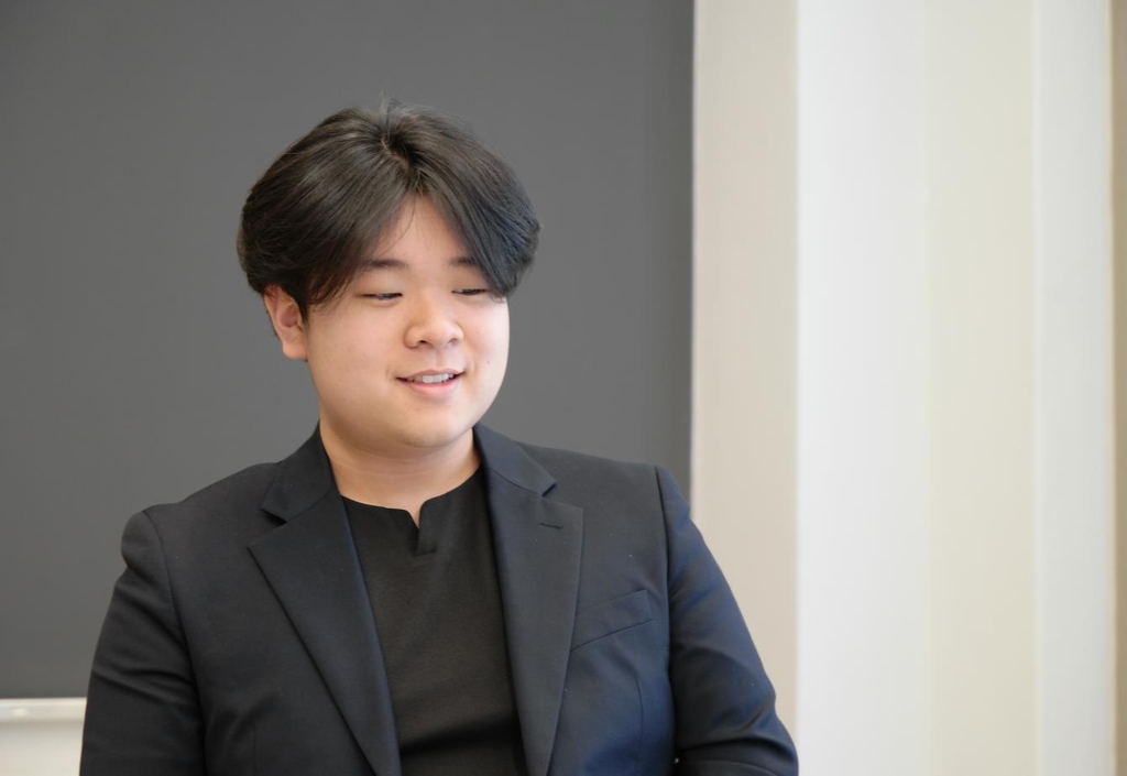 Cellist Han Jae-min speaks during a group media interview at the classical music agency Vincero's office in southern Seoul on April 27, 2023. (PHOTO NOT FOR SALE) (Yonhap) 