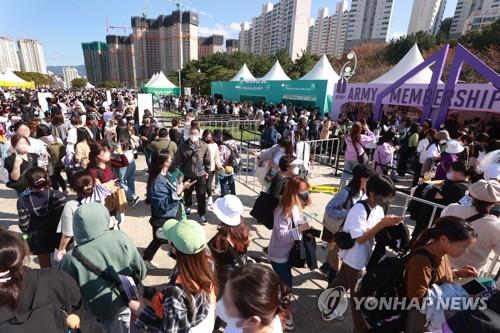 In this file photo, BTS fans wait in front of the Busan Asiad Main Stadium in the southeastern port city of Busan to attend the band's concert taking place on Oct. 15, 2022. (Yonhap)