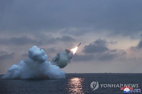 This photo, carried by North Korea's official Korean Central News Agency on Jan. 29, 2024, shows the North's firing of a submarine-launched cruise missile the previous day. North Korean leader Kim Jong-un oversaw the test-fire of the new Pulhwasal-3-31 strategic cruise missile and reviewed a project to build a nuclear-powered submarine, state media reported. (For Use Only in the Republic of Korea. No Redistribution) (Yonhap)