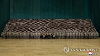 N.K. leader calls on public security officials to 'firmly defend' state unity