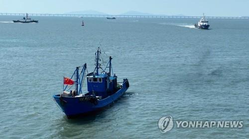 This image, provided by patrol authorities, shows a Chinese fishing boat seized by South Korea's Coast Guard in April. (PHOTO NOT FOR SALE) (Yonhap)