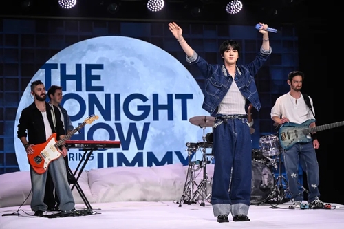 This photo provided by Todd Owyoung and NBC shows BTS' Jin (2nd from R) performing his new song on "The Tonight Show Starring Jimmy Fallon." (PHOTO NOT FOR SALE) (Yonhap)