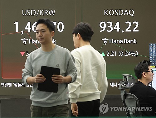 Seoul shares end tad lower on chip losses amid AI valuation jitters