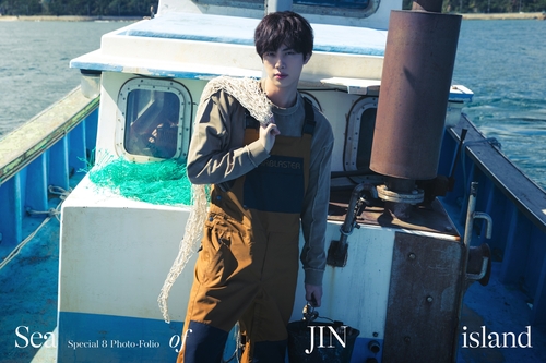 BTS : Jin sortira un album photos avant de partir à l'armée