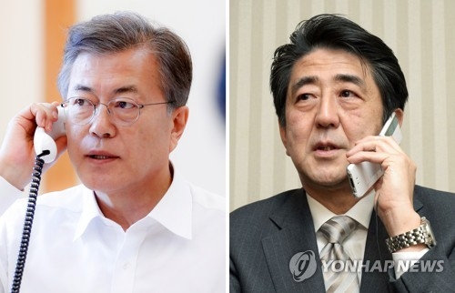 文大統領（左）と安倍首相（コラージュ）＝（聯合ニュース）