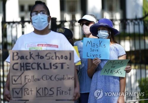 텍사스 '마스크 전쟁'…의무화 금지 대법원 결정에 불복 난타전