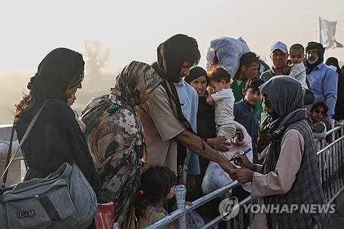 "트럼프, 아프간 난민 구한다 했지만…일부는 이미 본국…