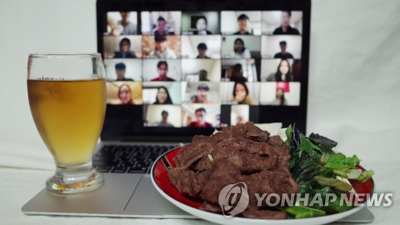 The photo, provided by IT firm Platfarm, shows a dish prepared by one of its employees at home for an online company dinner, with other participants seen on the screen of a laptop. (PHOTO NOT FOR SALE) (Yonhap)