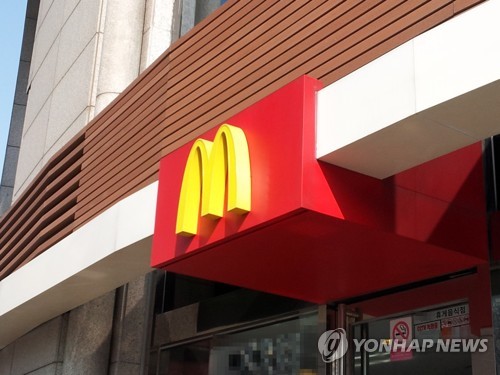 Appellate court acquits 3 officials in McDonald's tainted patty case