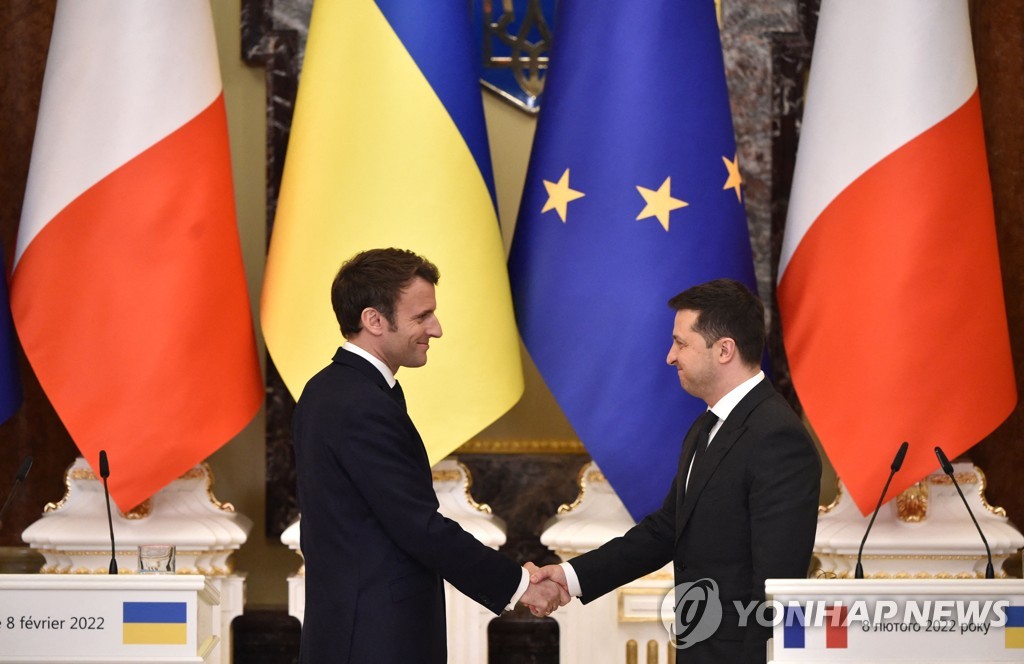 French * Ukrainian Top shaking hands