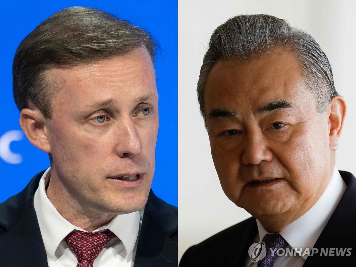This photo, released by AFP, shows U.S. National Security Advisor Jake Sullivan (L) and Chinese Foreign Minister Wang Yi. (Yonhap)