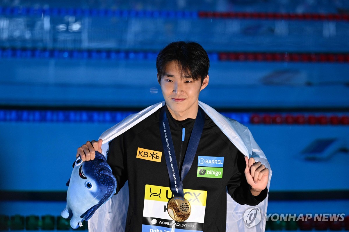 S. Korean swimmer Kim Woomin captures world title in men's 400m