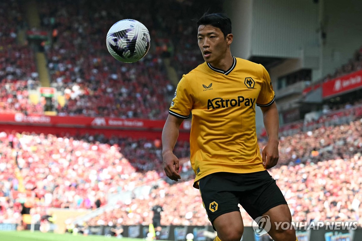 In this AFP photo, Hwang Hee-chan of Wolverhampton Wanderers eyes the ball during a Premier League match against Liverpool at Anfield in Liverpool, England, on May 19, 2024. (Yonhap)