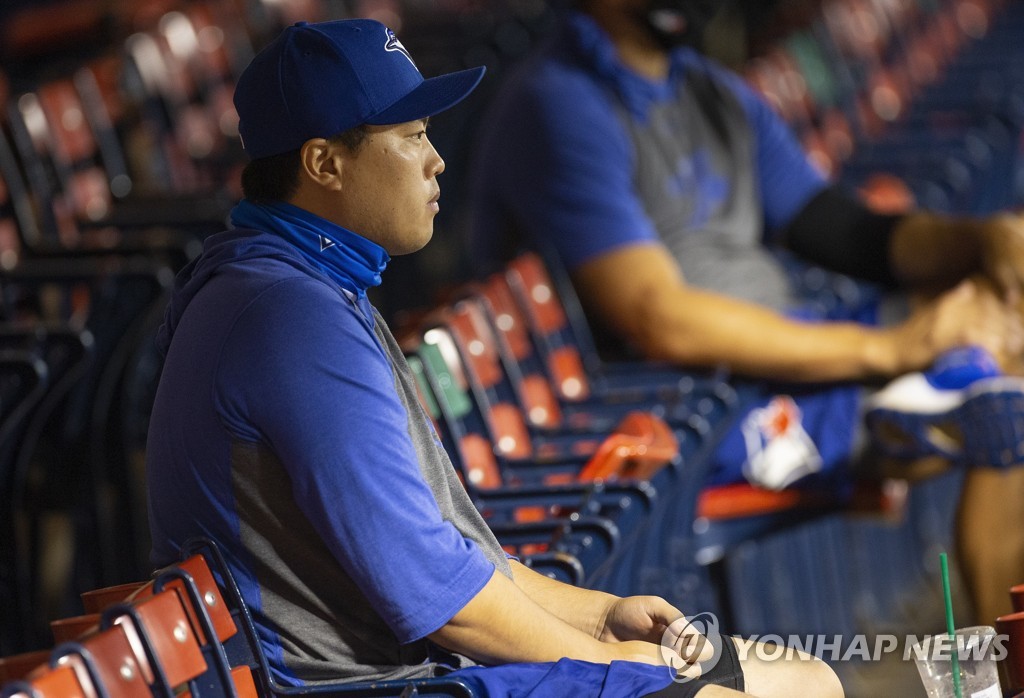 In this EPA file photo from Sept. 3, 2020, Ryu Hyun-jin of the Toronto Blue Jays watches his team in action against the Boston Red Sox from the stands at Fenway Park in Boston. (Yonhap)
