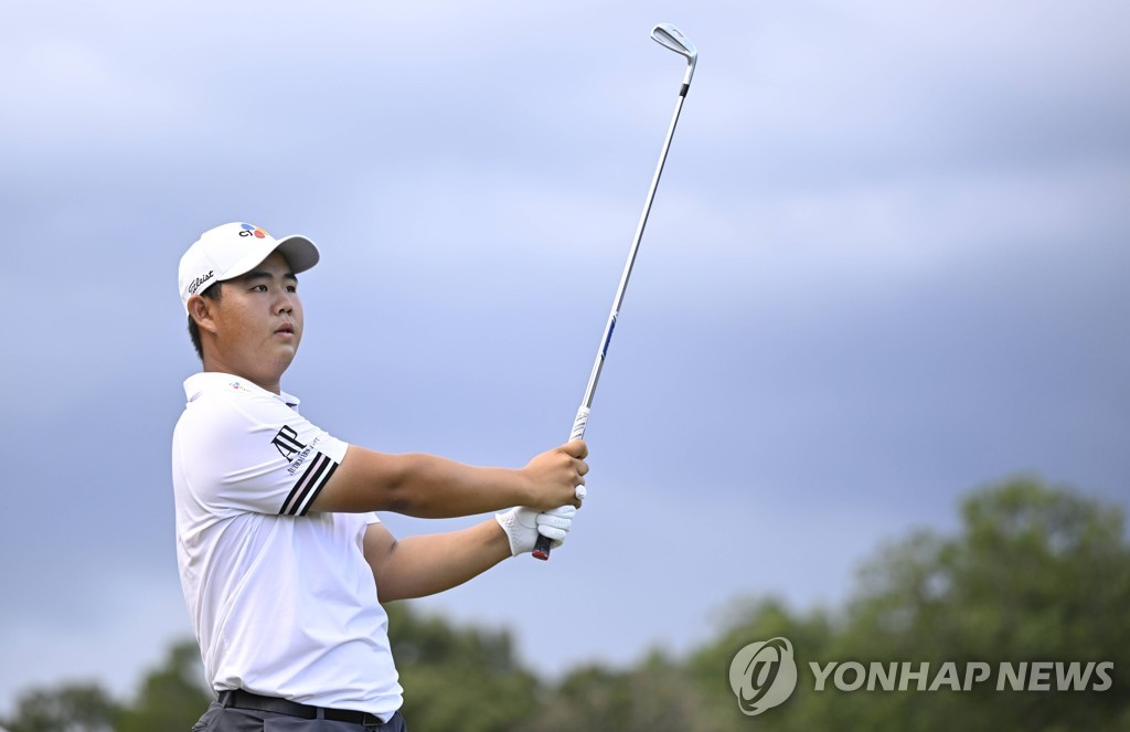 In this Getty Images photo, Kim Joo-hyung of South Korea watches his tee shot on the 16th hole during the final round of the Wyndham Championship at Sedgefield Country Club in Greensboro, North Carolina, on Aug. 7, 2022. (Yonhap)