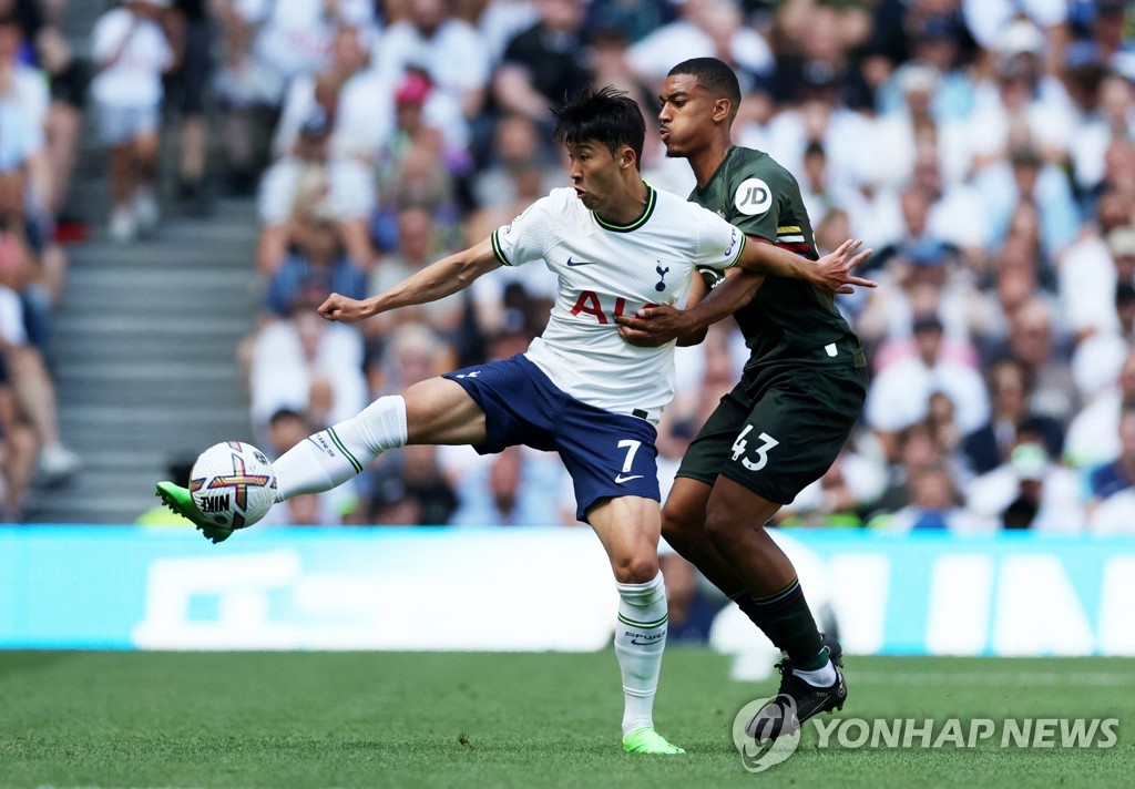 In this Action Images photo via Reuters, Son Heung-min of Tottenham Hotspur (L) is in action against Yann Valery of Southampton during the clubs' Premier League match at Tottenham Hotspur Stadium in London on Aug. 6, 2022. (Yonhap)