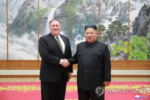 The photo provided by North Korea's Korean Central News Agency shows then U.S. Secretary of State Mike Pompeo shaking hands with North Korean leader Kim Jong-un during their meeting in Pyongyang on Oct. 7, 2018. (For Use Only in the Republic of Korea. No Redistribution) (Yonhap)