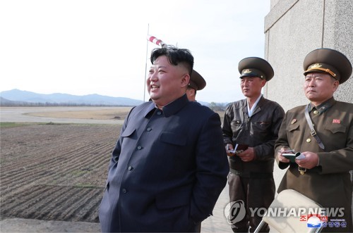 NK leader guides flight drill