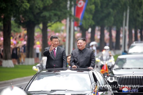  Kim, Xi agree to strengthen ties for regional peace, stability: KCNA