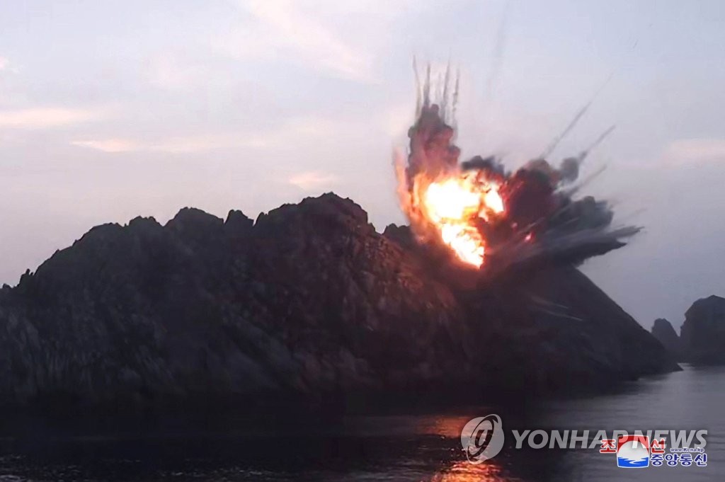 This photo, released by the Korean Central News Agency on Aug. 7, 2019, shows a missile hitting a "targeted islet in the East Sea" the previous day. (For Use Only in the Republic of Korea. No Redistribution) (Yonhap) 