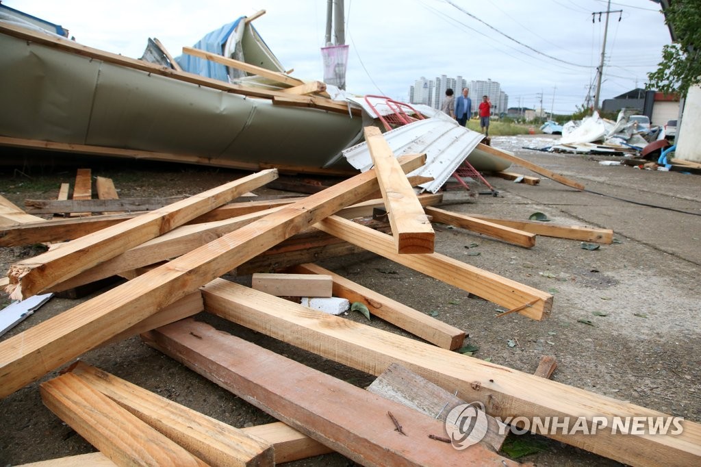 A roof of a house, damaged by Typhoon Tapah, sits on a street of the southern port city of Pohang on Sept. 23, 2019. (Yonhap)