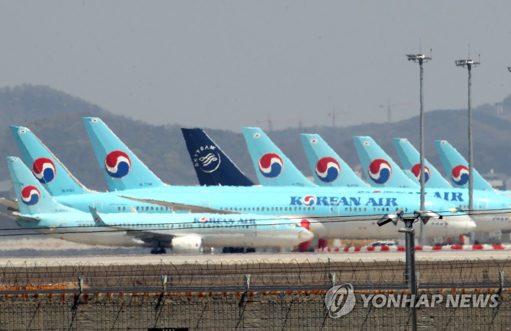 Planes of South Korea's flagship carrier, Korean Air, are grounded at Incheon International Airport, west of Seoul, on April 27, 2020. (Yonhap)