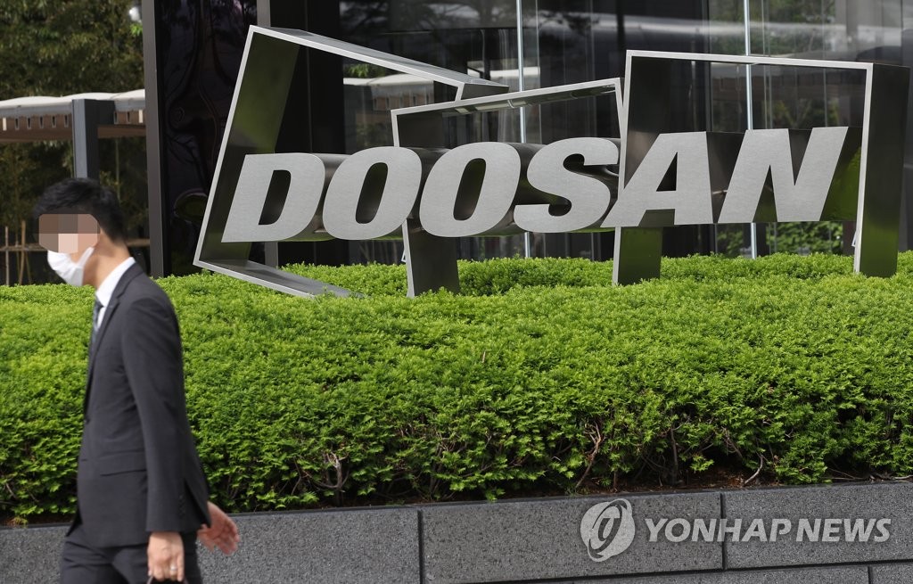 This file photo shows a Doosan Group logo in front of the group's building. (Yonhap)