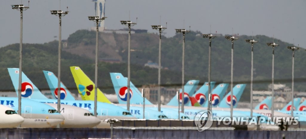 This photo taken May 13, 2020, shows Korean Air Lines' planes at Incheon International Airport in Incheon, just west of Seoul, amid the continuing coronavirus outbreak. (Yonhap)