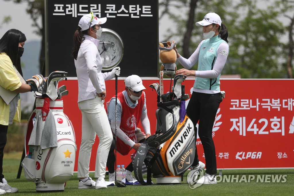 Players and caddies prepare to start the opening round of the 42nd Korea Ladies Professional Golf Association (KLPGA) Championship at Lakewood Country Club in Yangju, Gyeonggi Province, on May 14, 2020. (Yonhap)