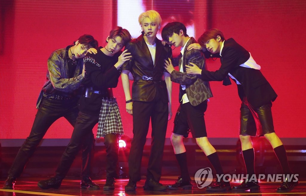 K-pop boy band Tomorrow X Together perform on stage during a media showcase for its new EP album, "The Dream Chapter: Eternity," at Yes 24 Live Hall in eastern Seoul on May 18, 2020. (Yonhap) 