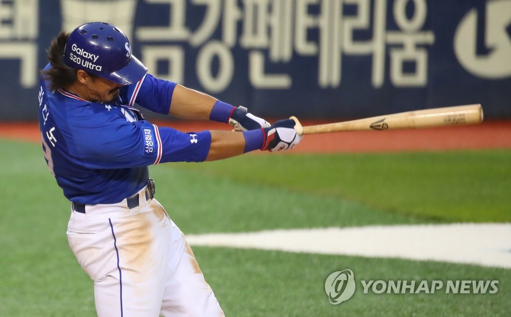 In this file photo from June 2, 2020, Tyler Saladino of the Samsung Lions hits a double against the LG Twins in a Korea Baseball Organization regular season game at Jamsil Baseball Stadium in Seoul. (Yonhap)