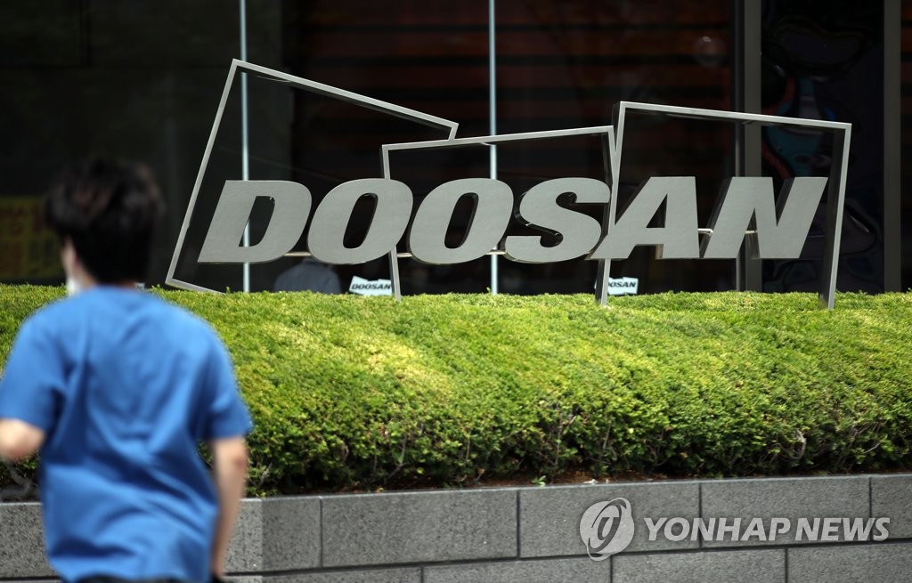This photo shows the logo of Doosan Group, to which Doosan Heavy Industries & Construction Co. belongs, in central Seoul. (Yonhap)