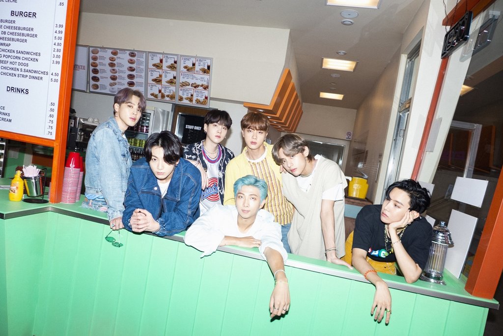 This photo, released by Big Hit Entertainment, shows a teaser for global K-pop band BTS' new song "Dynamite." BTS will drop the "Tropical Remix" and "Poolside Remix" of the song at noon (Seoul time) on Aug. 28, 2020 on major streaming services. (PHOTO NOT FOR SALE) (Yonhap)