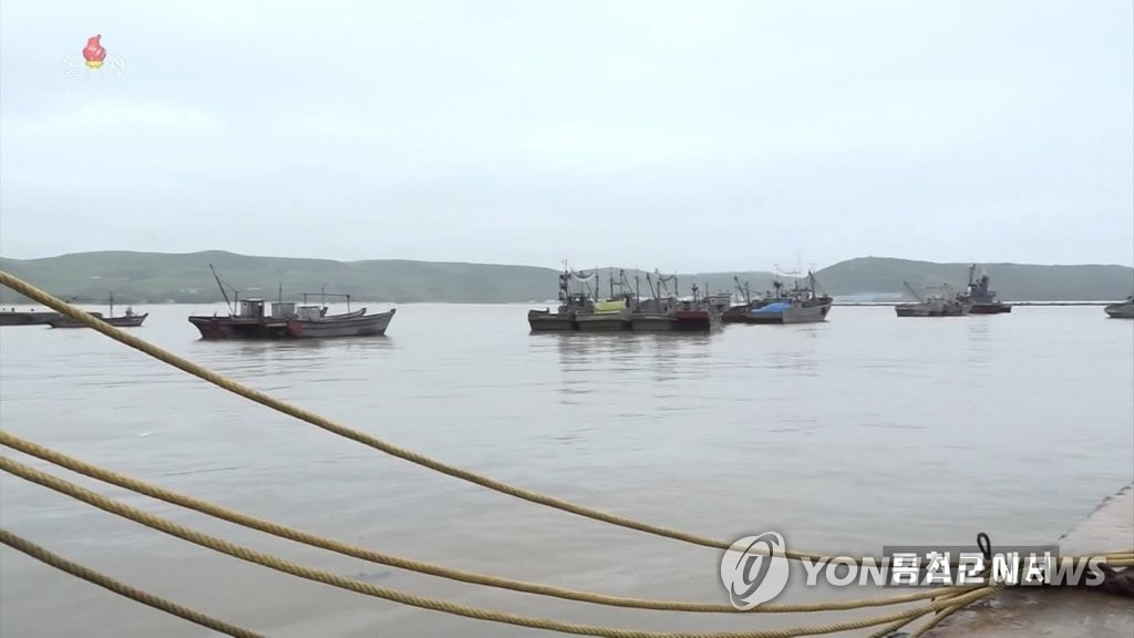 This photo, captured from North Korea's Korean Central TV on Sept. 2, 2020, shows vessels being brought to safety in the eastern province of Kangwon to protect against Typhoon Maysak. (For Use Only in the Republic of Korea. No Redistribution) (Yonhap)