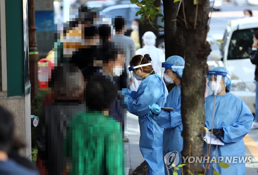 S. Korea to decide whether to further extend tougher virus curbs over weekend