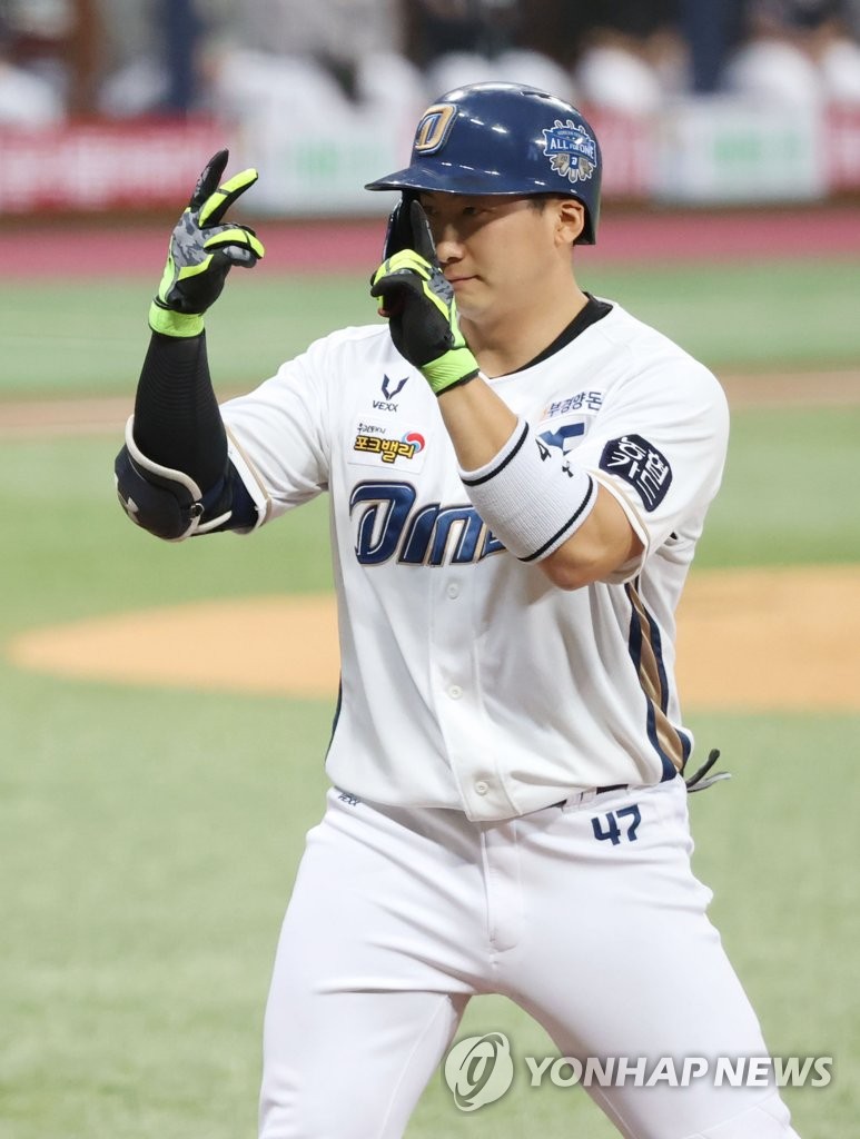In this file photo from Nov. 24, 2020, Na Sung-bum of the NC Dinos celebrates his single against the Doosan Bears in the bottom of the first inning of Game 6 of the Korean Series at Gocheok Sky Dome in Seoul. (Yonhap)
