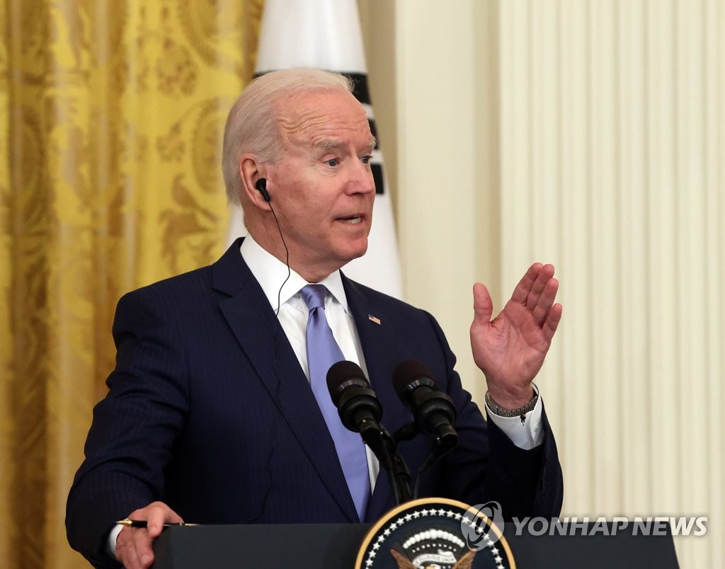 This file photo, taken May 21, 2021, shows U.S. President Joe Biden speaking during a joint press conference with South Korean President Moon Jae-in at the White House in Washington. (Yonhap)