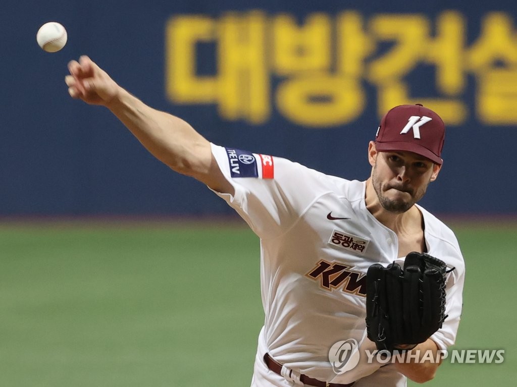In this file photo from June 25, 2021, Jake Brigham of the Kiwoom Heroes pitches against the Kia Tigers during a Korea Baseball Organization regular season game at Gocheok Sky Dome in Seoul. (Yonhap)