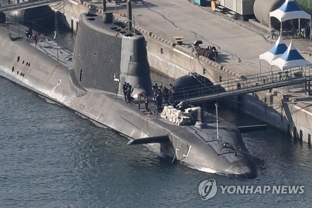 The HMS Artful, a nuclear-powered fleet submarine accompanying the British Royal Navy's HMS Queen Elizabeth aircraft carrier, is docked at a naval base in Busan on Aug. 12, 2021. (Yonhap)