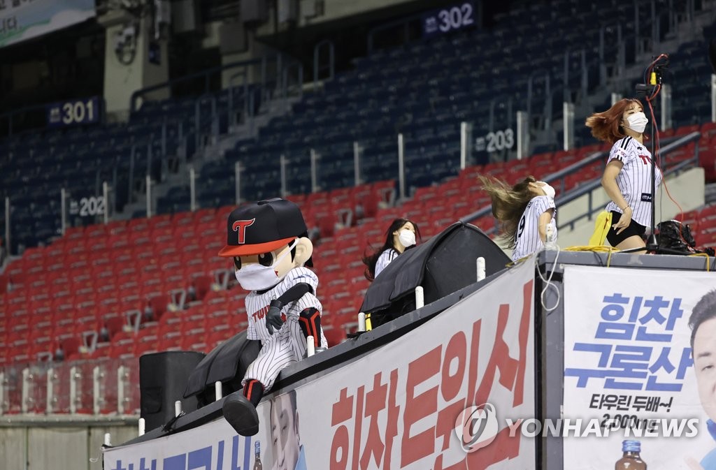 In this file photo from Sept. 10, 2021, a mascot for the LG Twins takes a breather during a Korea Baseball Organization regular season game between the Twins and the Hanwha Eagles at Jamsil Baseball Stadium in Seoul. (Yonhap)
