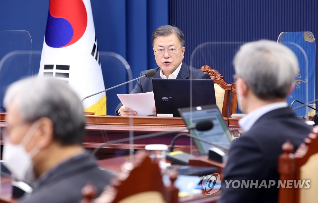 In this file photo, President Moon Jae-in presides over a Cabinet meeting at the presidential office in Seoul on Feb, 22, 2022. (Yonhap)