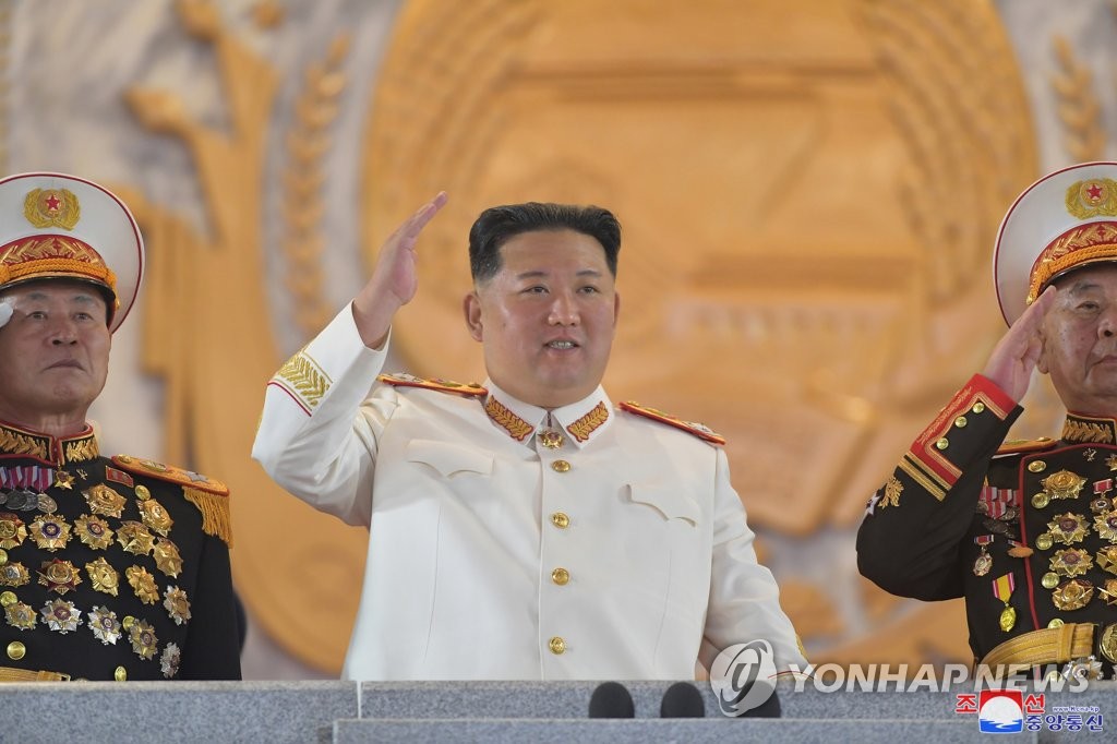 North Korean leader waves during a military parade in Pyongyang on April 25, 2022, in this photo released by the North's official Korean Central News Agency. (For Use Only in the Republic of Korea. No Redistribution)